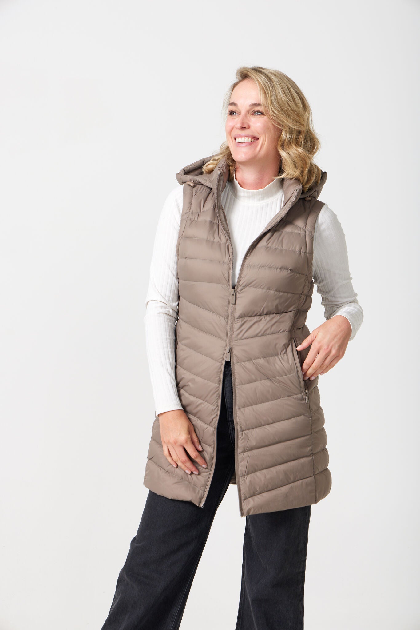 Chai Longline Gilet™ — women’s sleeveless quilted puffer vest in neutral chai brown, longline design with hood, ideal for layering in South Africa