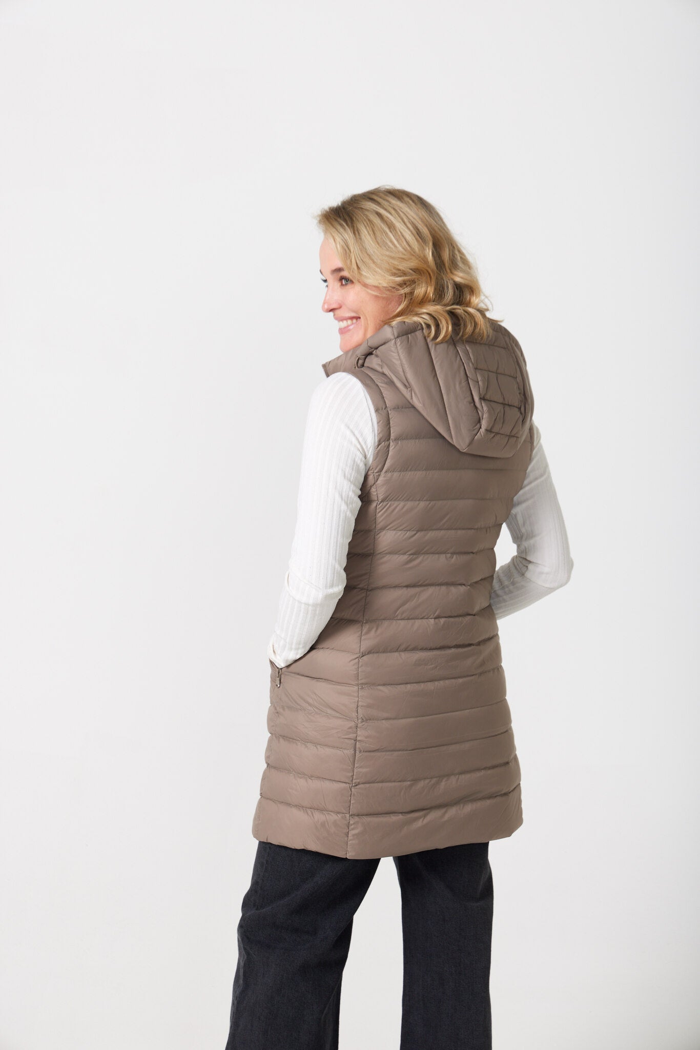 Chai Longline Gilet™ — women’s sleeveless quilted puffer vest in neutral chai brown, longline design with hood, ideal for layering in South Africa