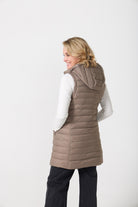 Chai Longline Gilet™ — women’s sleeveless quilted puffer vest in neutral chai brown, longline design with hood, ideal for layering in South Africa