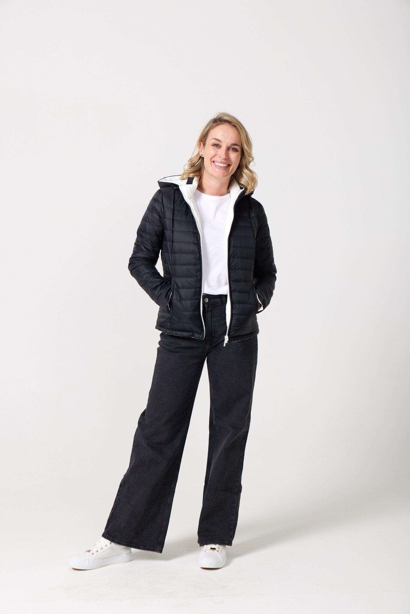 Women’s reversible puffer jacket in white and black, lightweight and warm for layering in South Africa — Midnight x Salt Classic Jacket™