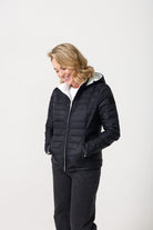 Women’s reversible puffer jacket in white and black, lightweight and warm for layering in South Africa — Midnight x Salt Classic Jacket™