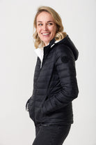 Women’s reversible puffer jacket in white and black, lightweight and warm for layering in South Africa — Midnight x Salt Classic Jacket™