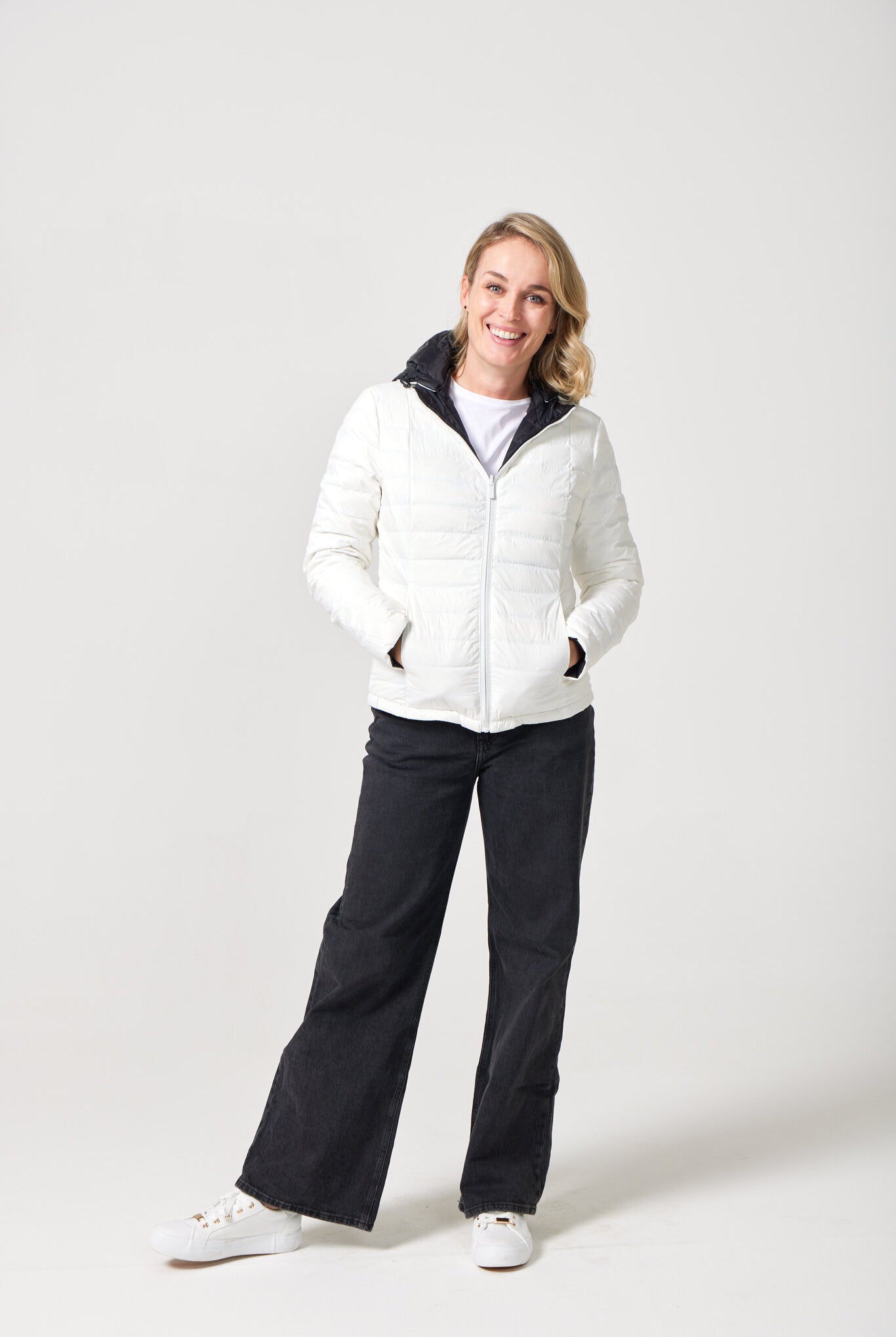 Women’s reversible puffer jacket in white and black, lightweight and warm for layering in South Africa — Midnight x Salt Classic Jacket™