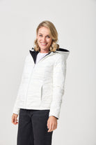 Women’s reversible puffer jacket in white and black, lightweight and warm for layering in South Africa — Midnight x Salt Classic Jacket™