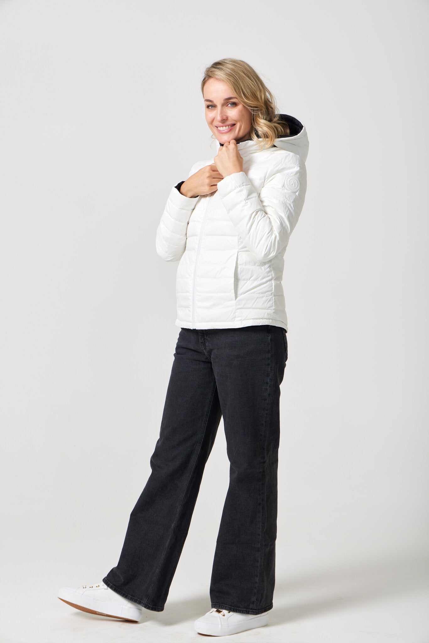 Women’s reversible puffer jacket in white and black, lightweight and warm for layering in South Africa — Midnight x Salt Classic Jacket™