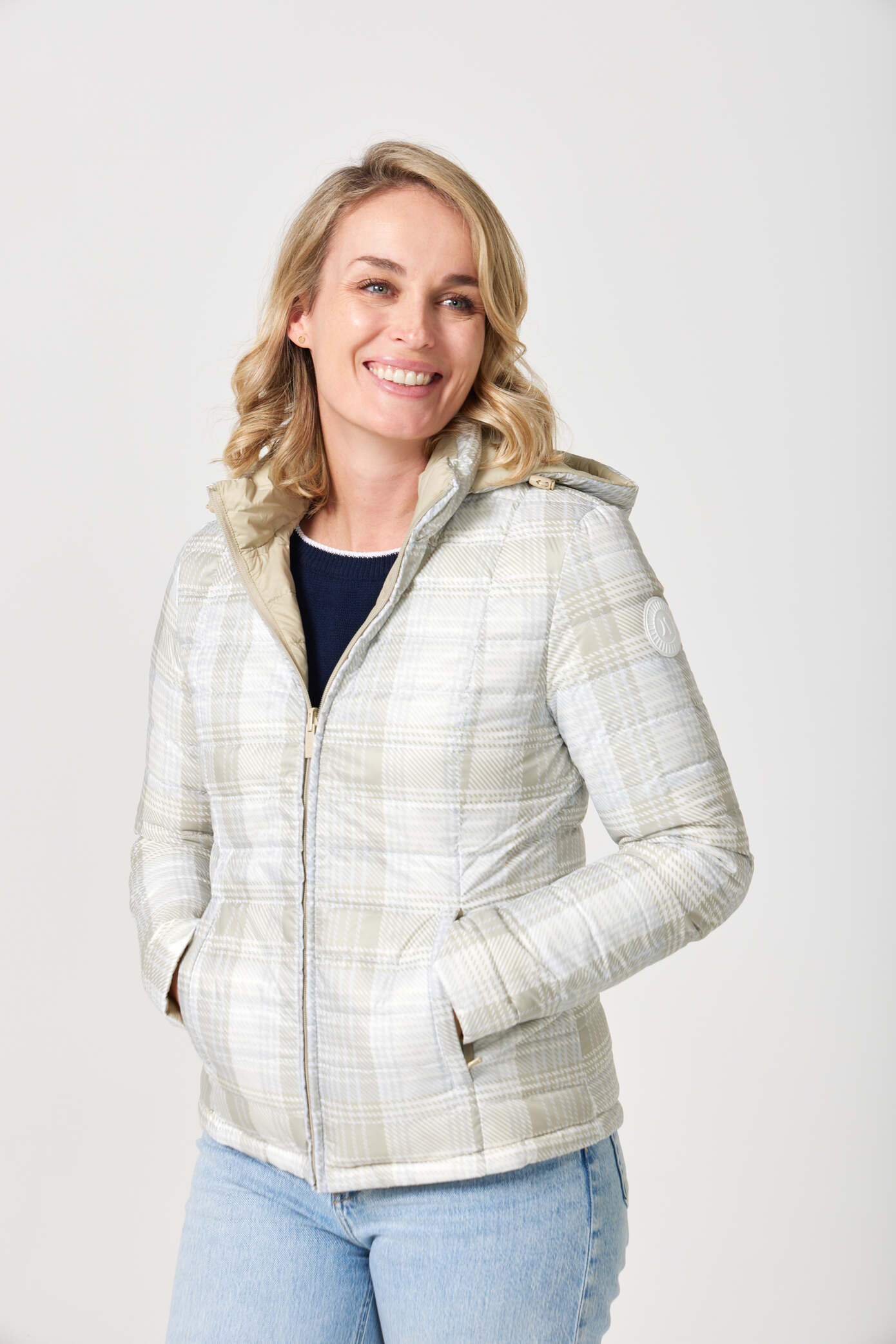 Women’s insulated hooded jacket in tartan plaid with champagne beige tones, designed for warmth and layering in South Africa’s winter season — Tartan x Champagne Classic Jacket™