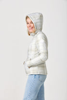 Women’s insulated hooded jacket in tartan plaid with champagne beige tones, designed for warmth and layering in South Africa’s winter season — Tartan x Champagne Classic Jacket™