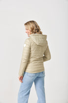 Women’s insulated hooded jacket in tartan plaid with champagne beige tones, designed for warmth and layering in South Africa’s winter season — Tartan x Champagne Classic Jacket™