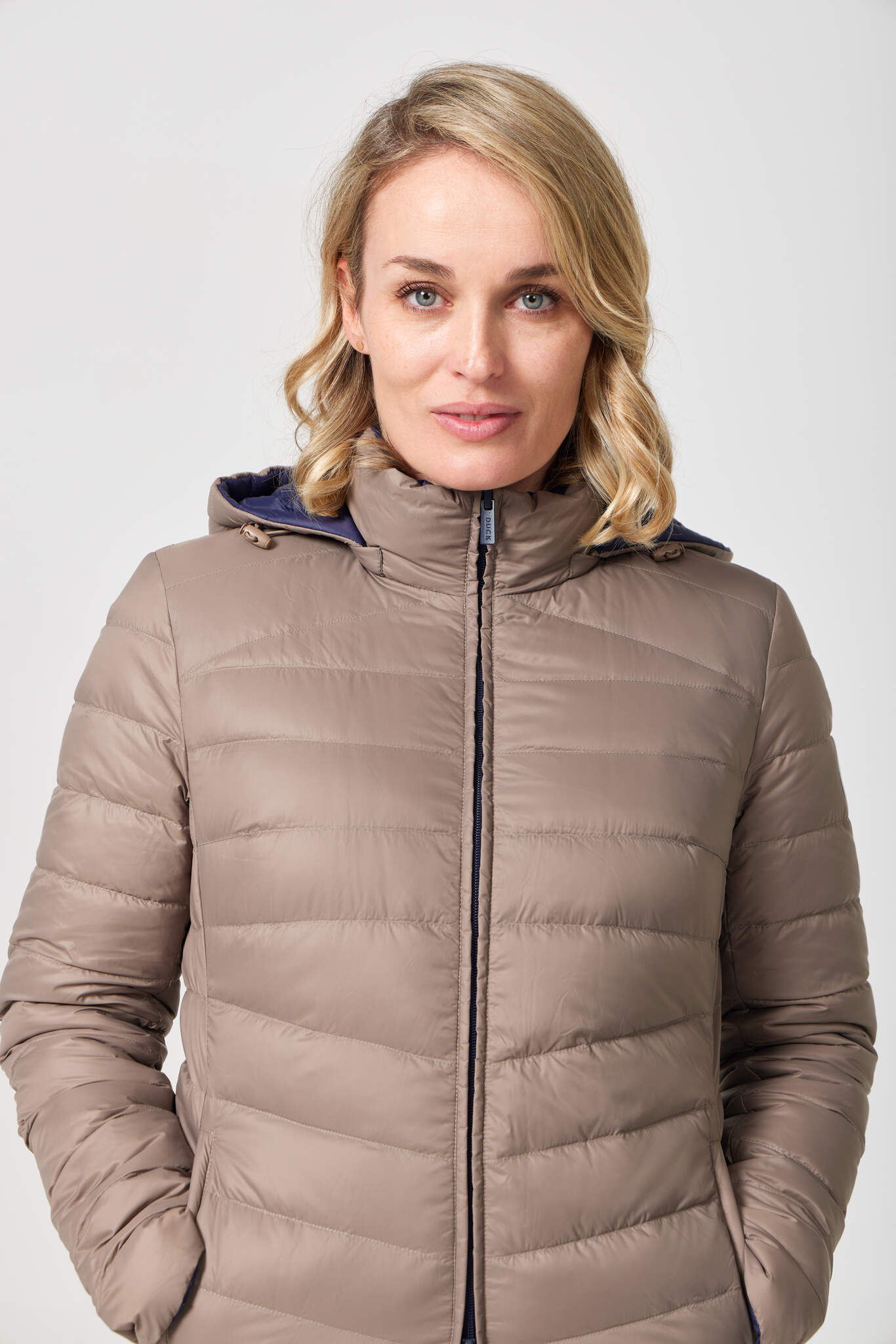 Toffee x Navy Classic Parka™ reversible insulated hooded parka in navy blue and toffee, designed for warmth and versatility in South Africa’s winter season