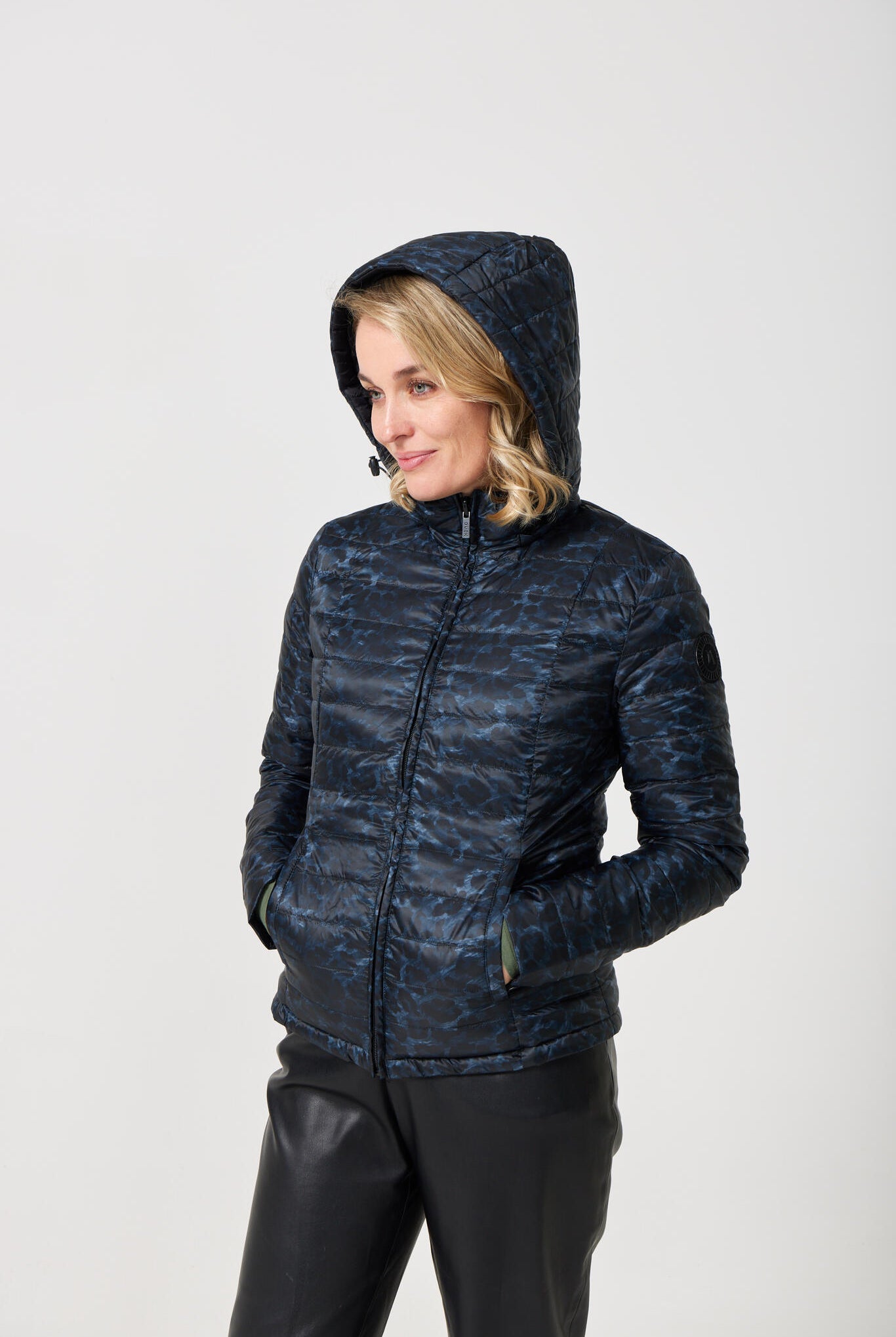 Women’s reversible black and printed puffer jacket, lightweight and versatile for layering in South Africa — Midnight x Panther Classic Jacket™