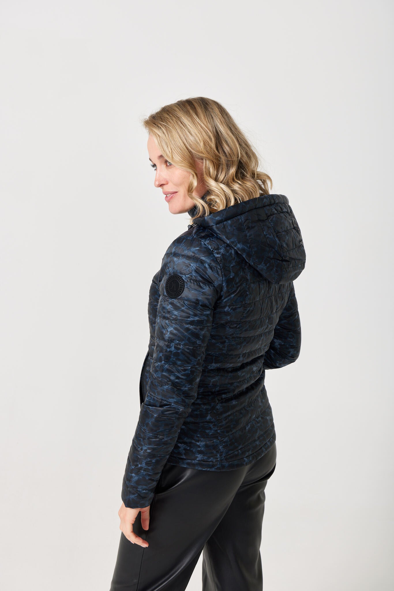 Women’s reversible black and printed puffer jacket, lightweight and versatile for layering in South Africa — Midnight x Panther Classic Jacket™
