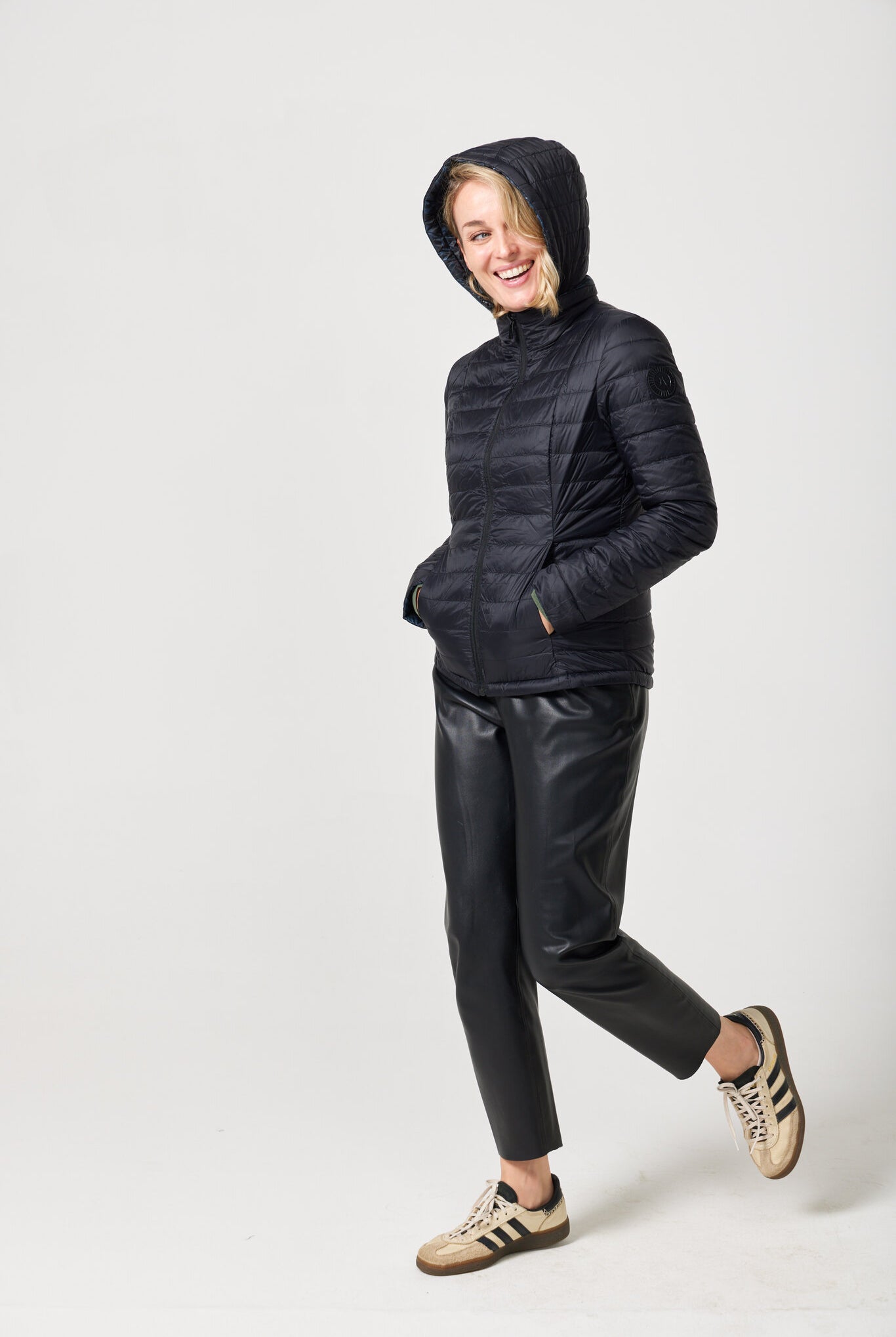 Women’s reversible black and printed puffer jacket, lightweight and versatile for layering in South Africa — Midnight x Panther Classic Jacket™