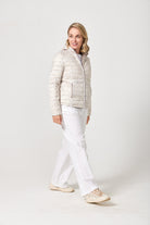 Women’s Sand x Leopard Classic Jacket™ reversible lightweight puffer in soft beige and subtle leopard print, versatile jacket for layering in South Africa