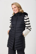 Midnight Longline Gilet™ — women’s sleeveless gilet in black, longline cut with hood, versatile layering piece for winter in South Africa.