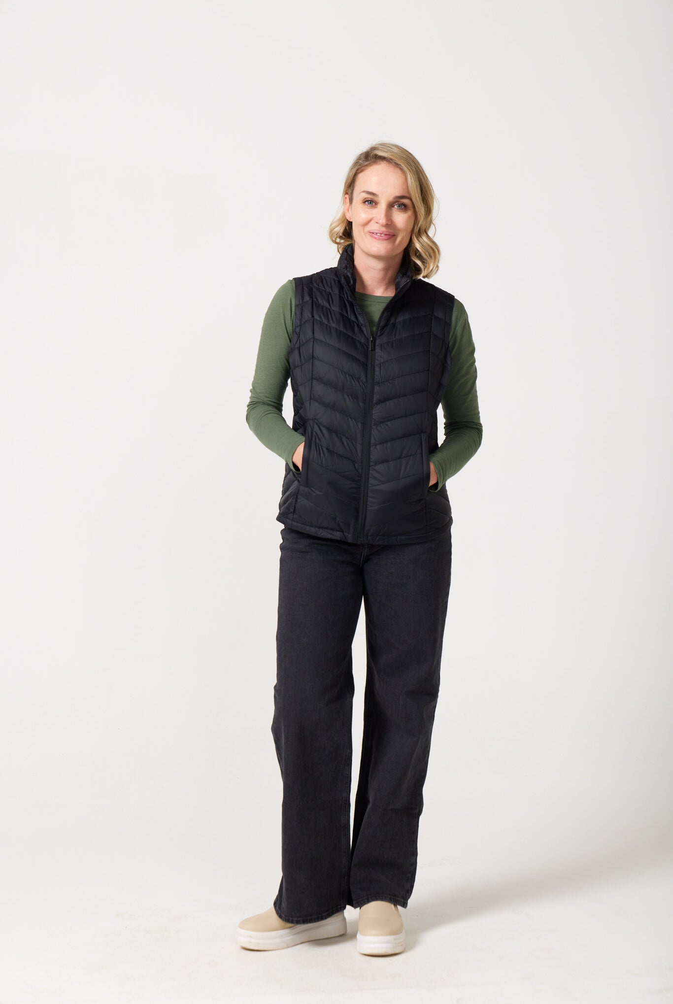 Midnight Classic Gilet™ — women’s sleeveless puffer vest in sleek midnight black, lightweight and versatile for layering in South Africa.