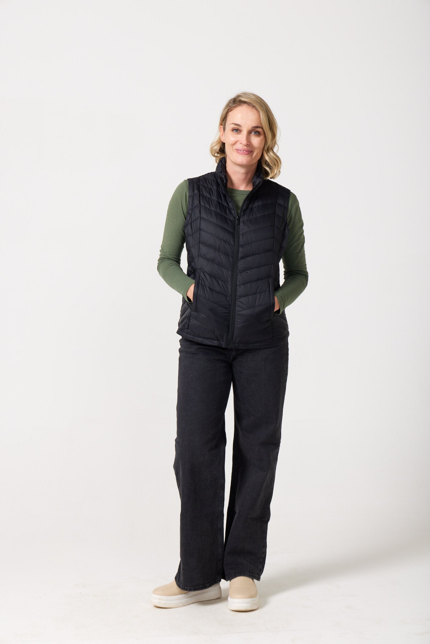 Midnight Classic Gilet™ — women’s sleeveless puffer vest in sleek midnight black, lightweight and versatile for layering in South Africa.