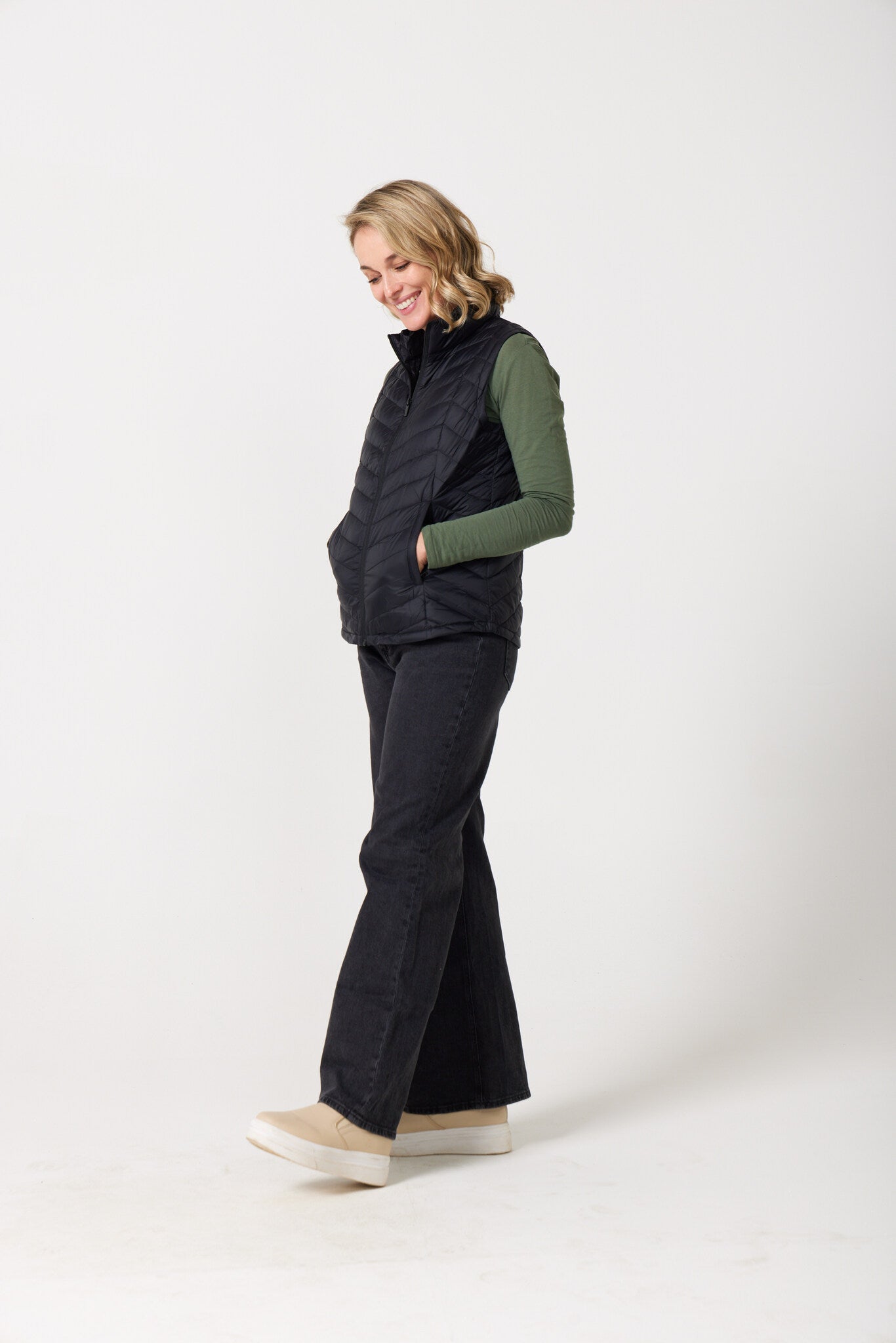 Midnight Classic Gilet™ — women’s sleeveless puffer vest in sleek midnight black, lightweight and versatile for layering in South Africa.