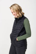 Midnight Classic Gilet™ — women’s sleeveless puffer vest in sleek midnight black, lightweight and versatile for layering in South Africa.