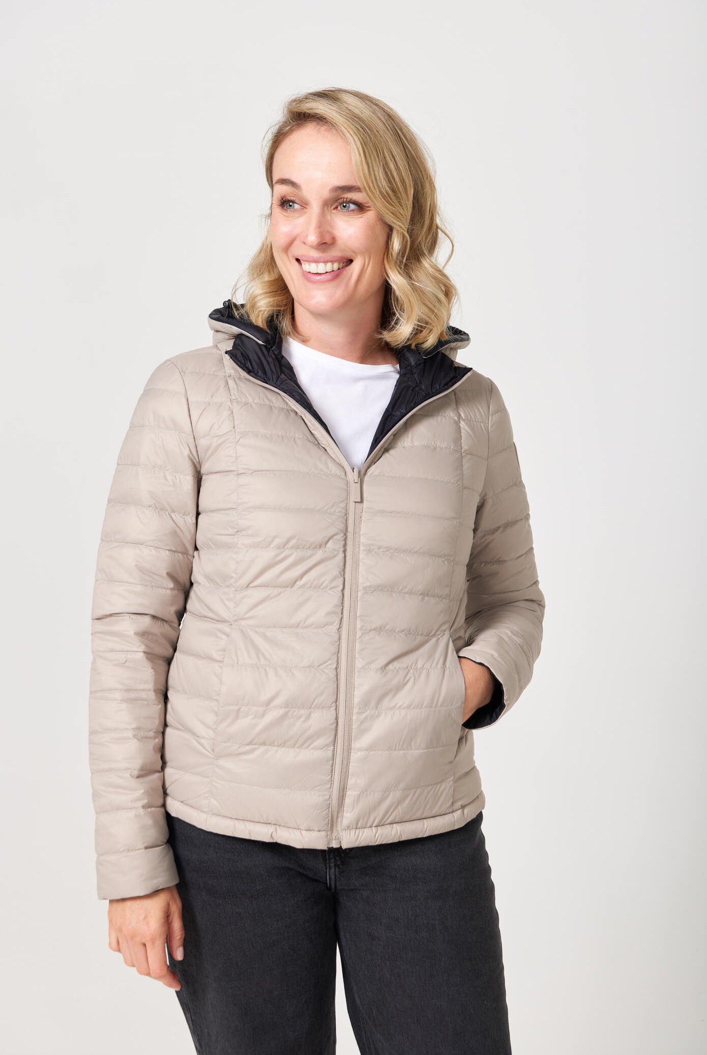 Women’s Ebony x Ivory Classic Jacket™ reversible lightweight puffer in neutral beige and black, versatile outerwear for layering in South Africa
