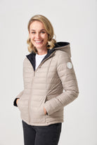 Women’s Ebony x Ivory Classic Jacket™ reversible lightweight puffer in neutral beige and black, versatile outerwear for layering in South Africa