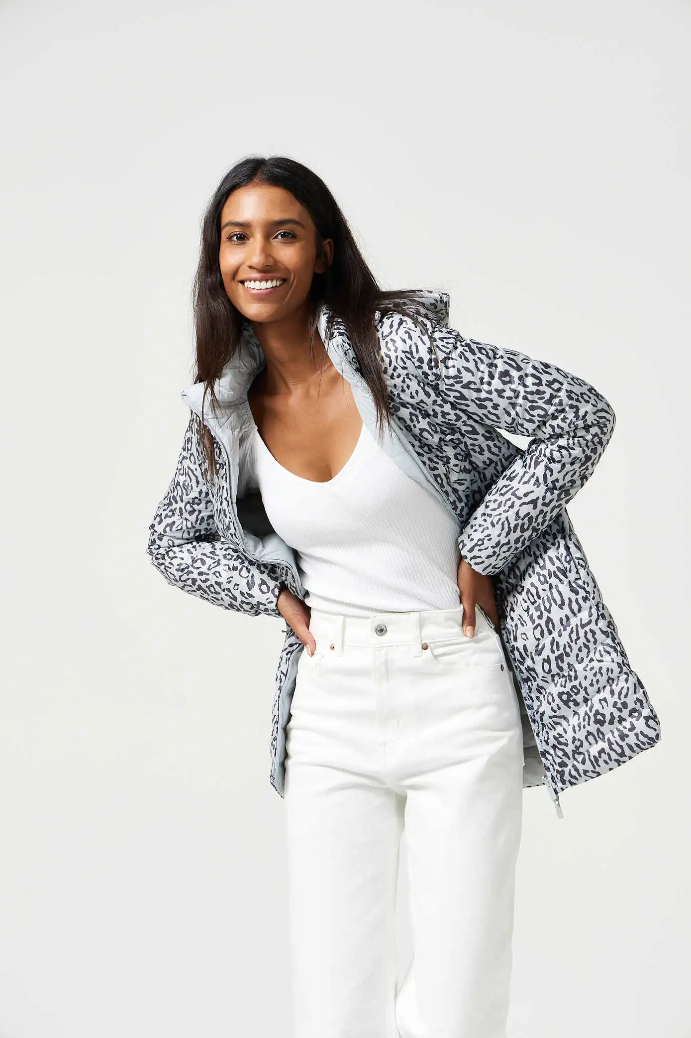 Women’s long Jaguar print parka in grey and white, lightweight insulated winter coat with hood and side pockets from Duck Apparel South Africa