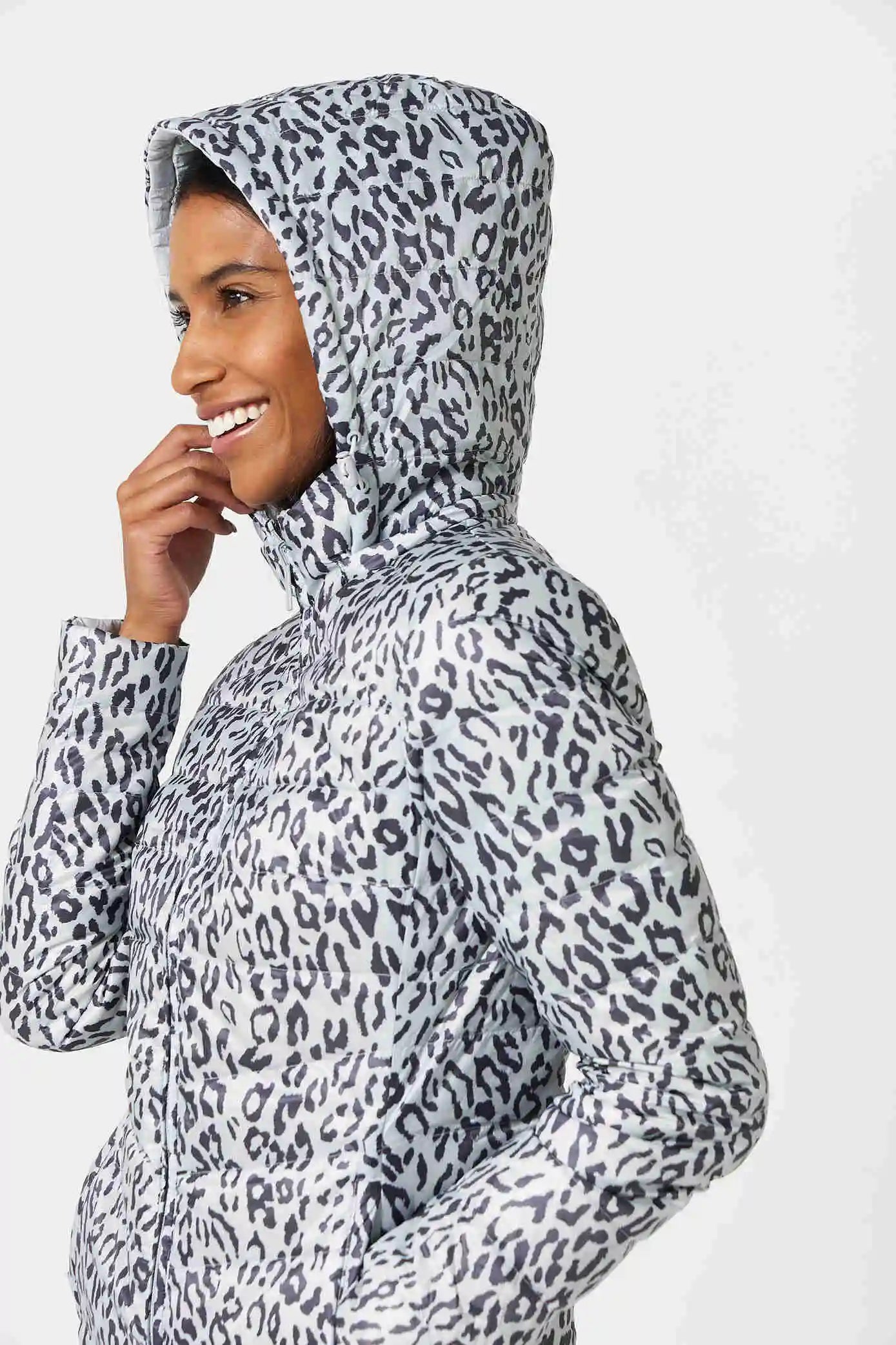 Women’s long Jaguar print parka in grey and white, lightweight insulated winter coat with hood and side pockets from Duck Apparel South Africa