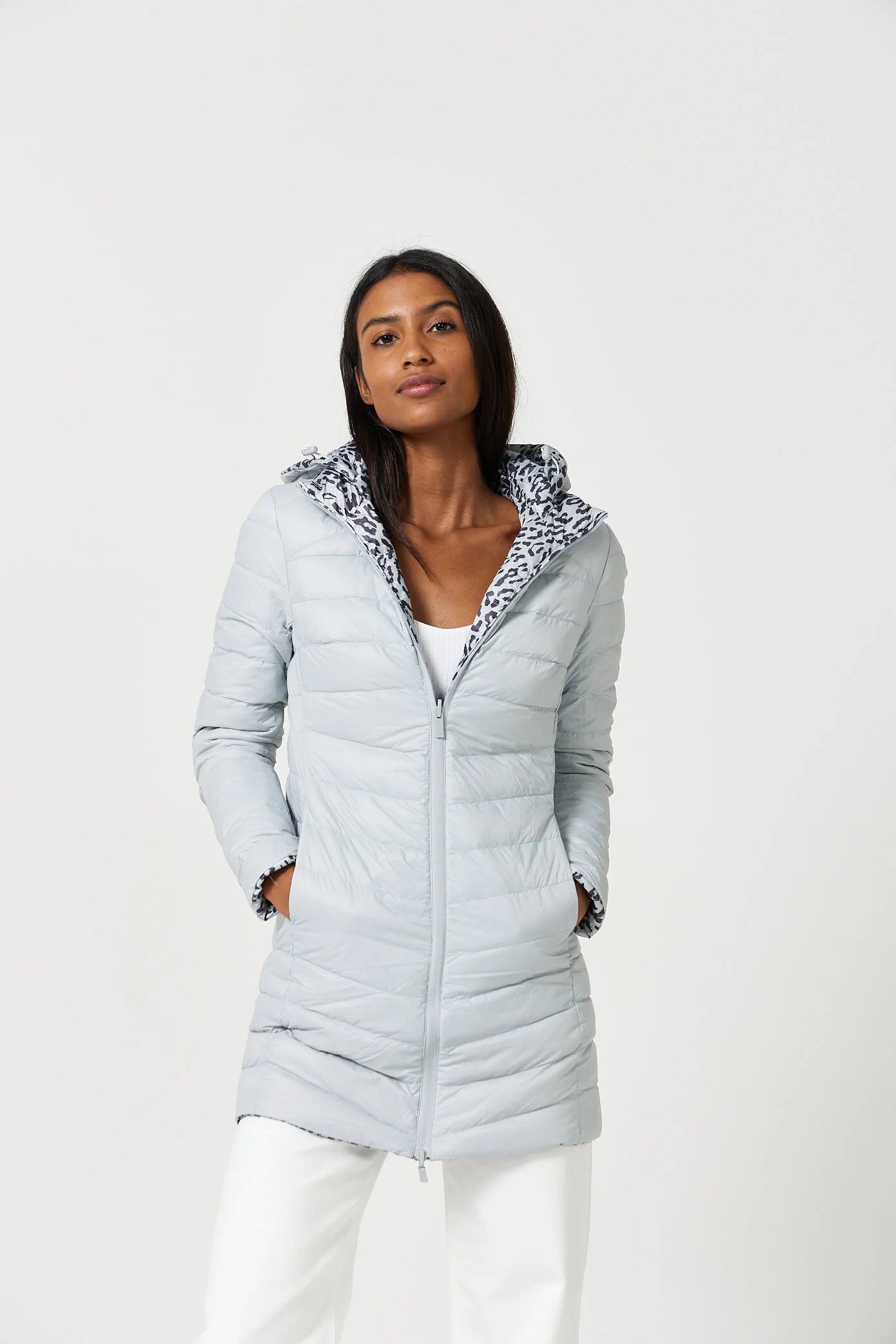 Women’s long Jaguar print parka in grey and white, lightweight insulated winter coat with hood and side pockets from Duck Apparel South Africa