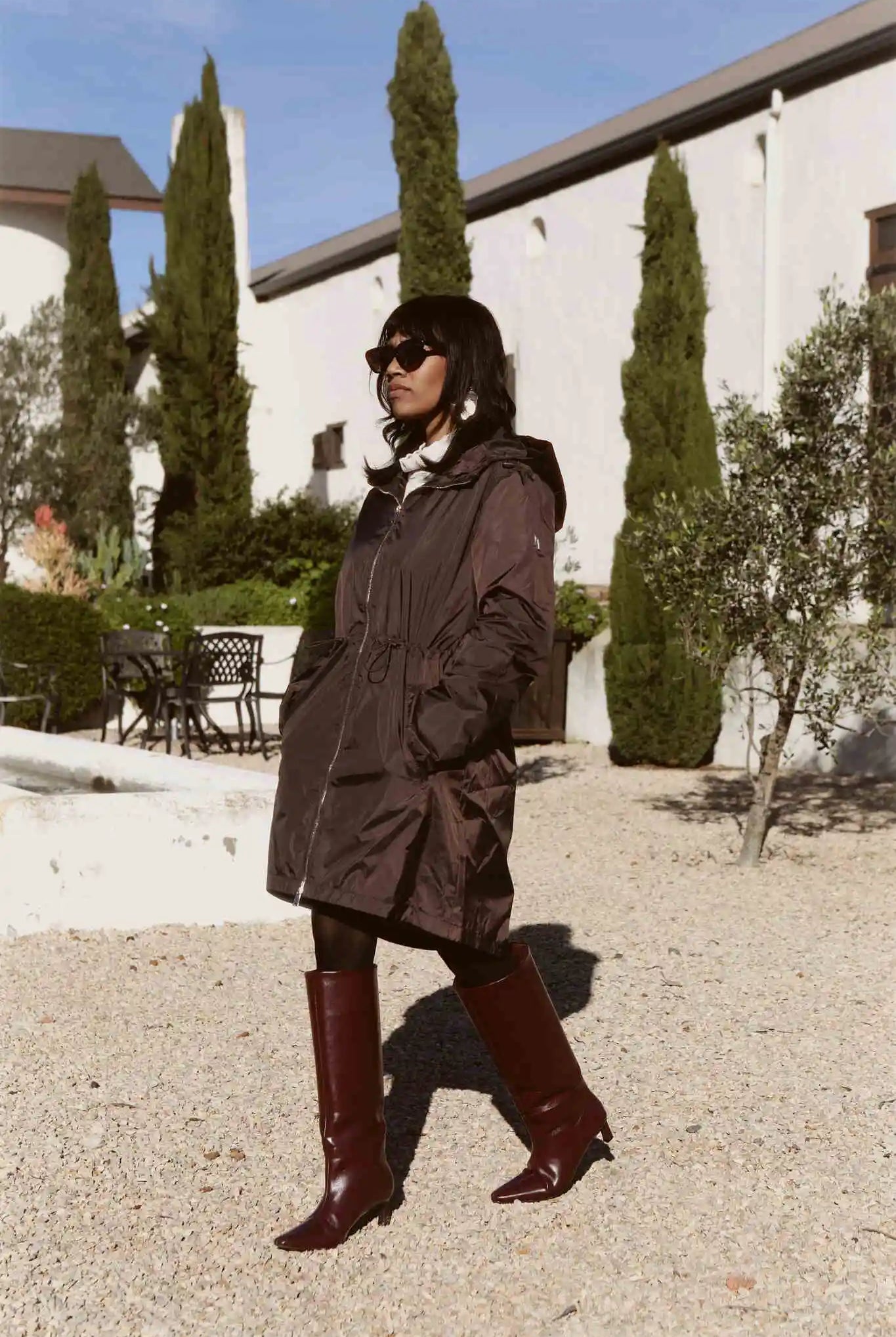 Truffle Haze raincoat in dark brown, lightweight hooded waterproof raincoat ideal for South Africa’s rainy season and wet climate