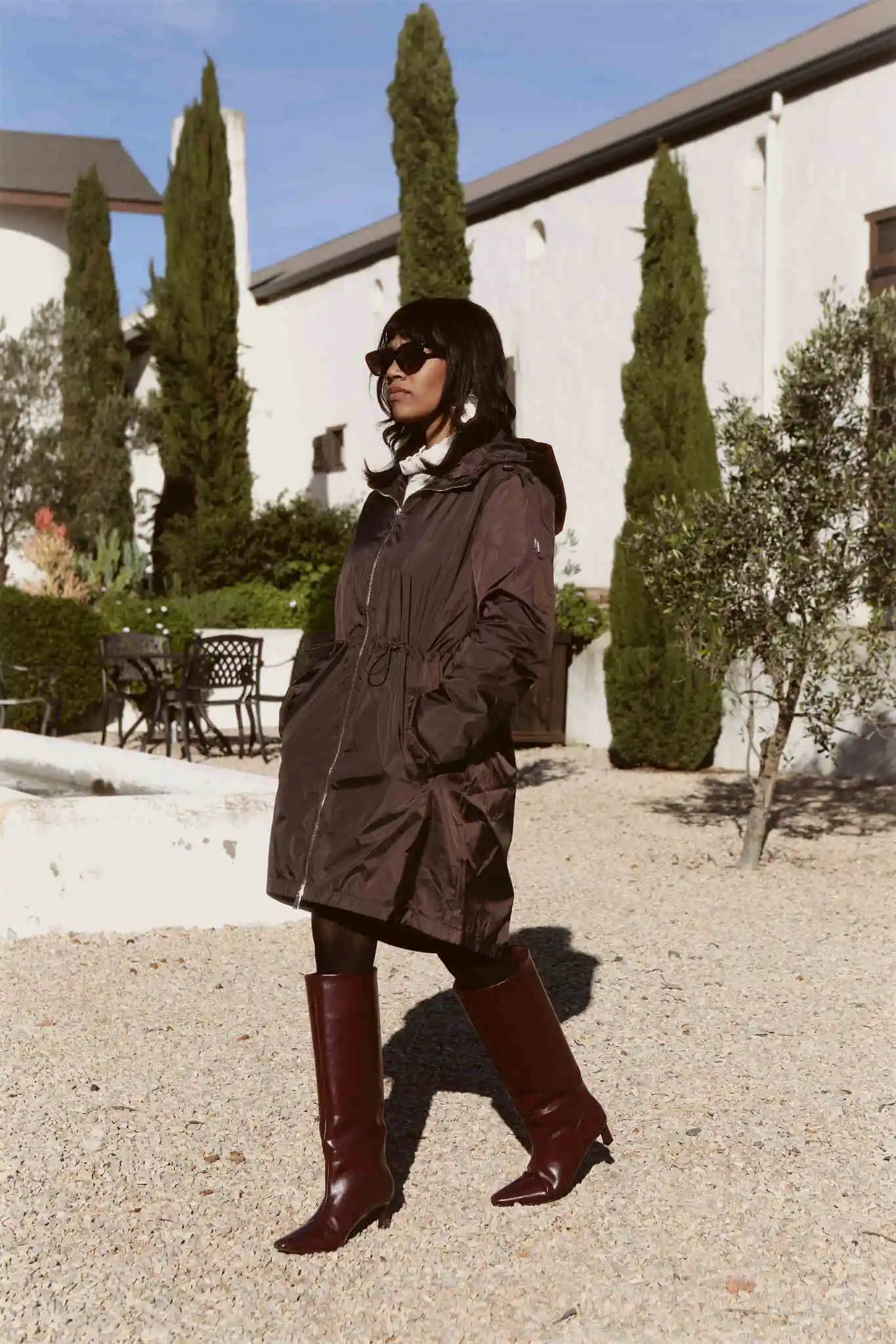 Truffle Haze raincoat in dark brown, lightweight hooded waterproof raincoat ideal for South Africa’s rainy season and wet climate