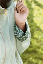 Madame Verde Vol 1 raincoat in light green with hood, stylish waterproof jacket for rainy days in South Africa