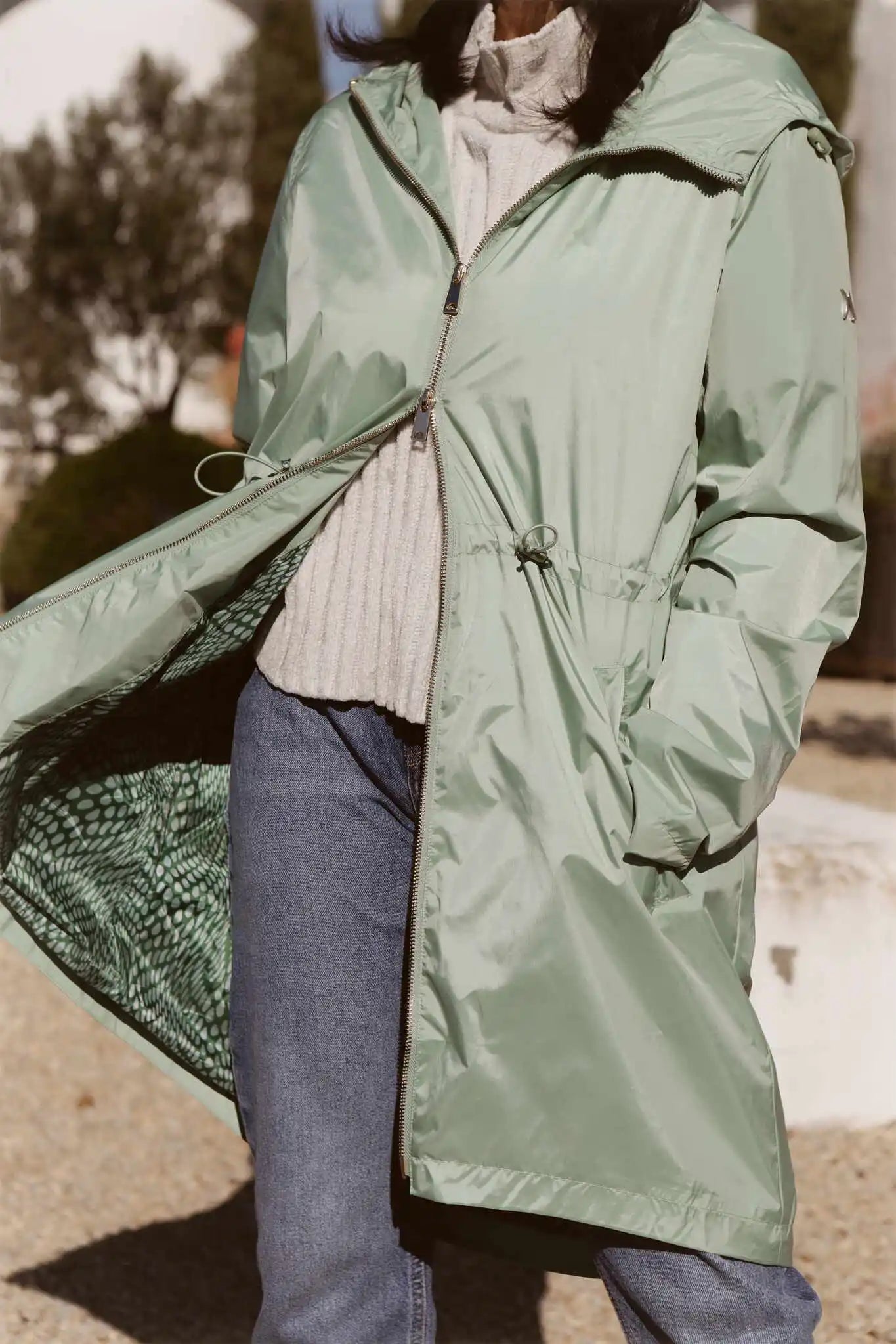 Madame Verde Vol 1 raincoat in light green with hood, stylish waterproof jacket for rainy days in South Africa