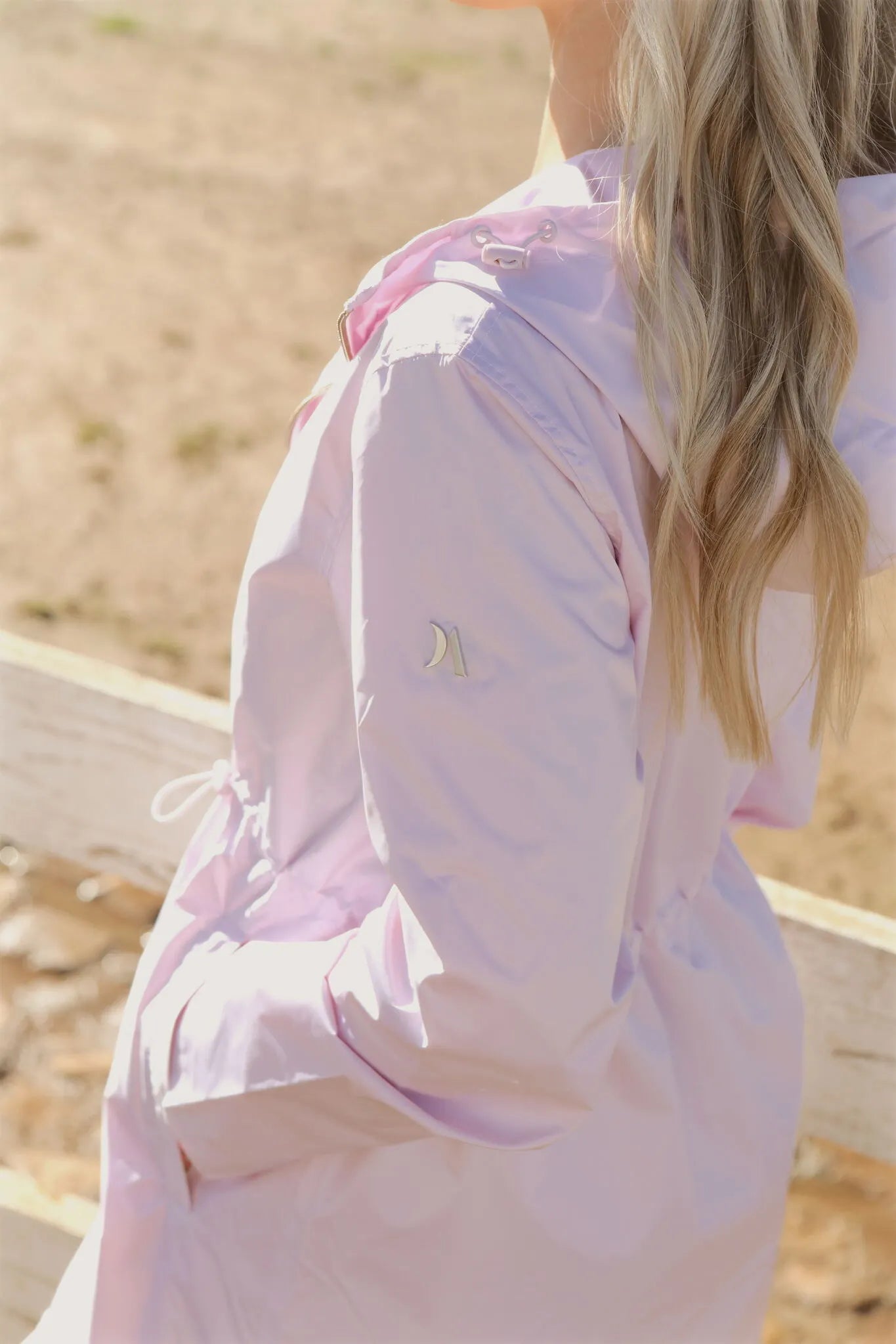 Rosewater Mist raincoat in pastel pink with hood, lightweight waterproof jacket for stylish rainy days in South Africa