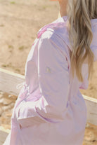 Rosewater Mist raincoat in pastel pink with hood, lightweight waterproof jacket for stylish rainy days in South Africa