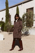 Truffle Haze raincoat in dark brown, lightweight hooded waterproof raincoat ideal for South Africa’s rainy season and wet climate