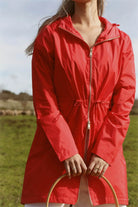 Lipstick Crush No 5 raincoat in bold red, lightweight hooded waterproof raincoat perfect for South Africa’s rainy climate