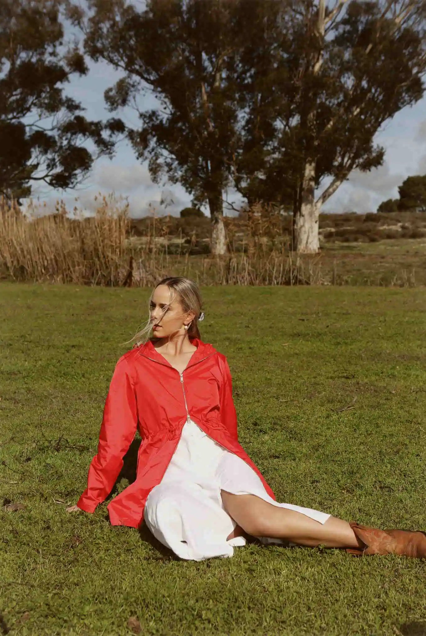 Lipstick Crush No 5 raincoat in bold red, lightweight hooded waterproof raincoat perfect for South Africa’s rainy climate