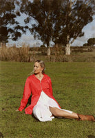 Lipstick Crush No 5 raincoat in bold red, lightweight hooded waterproof raincoat perfect for South Africa’s rainy climate
