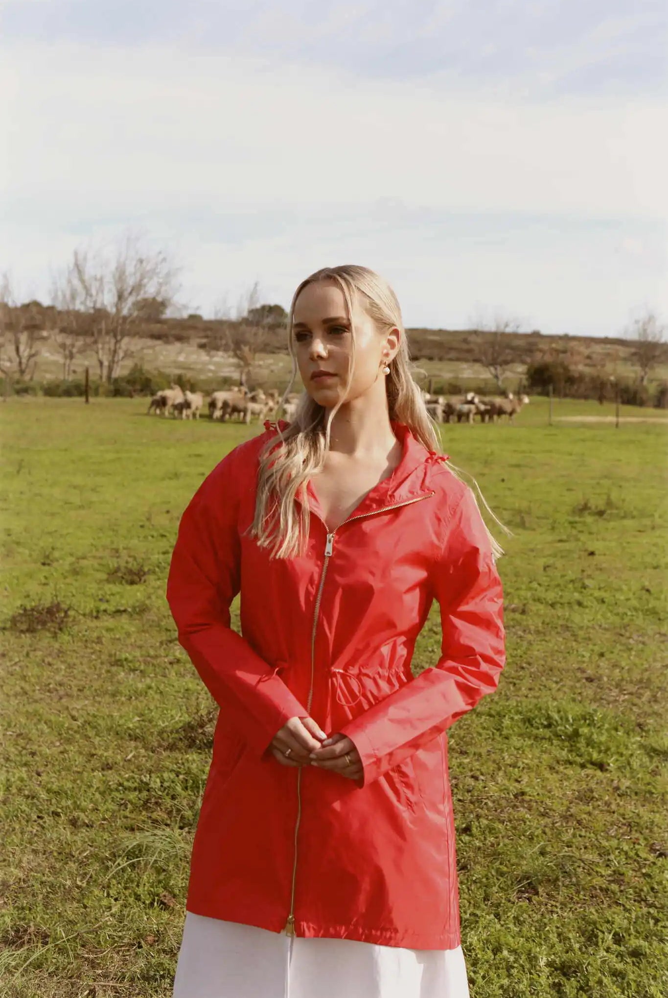 Lipstick Crush No 5 raincoat in bold red, lightweight hooded waterproof raincoat perfect for South Africa’s rainy climate