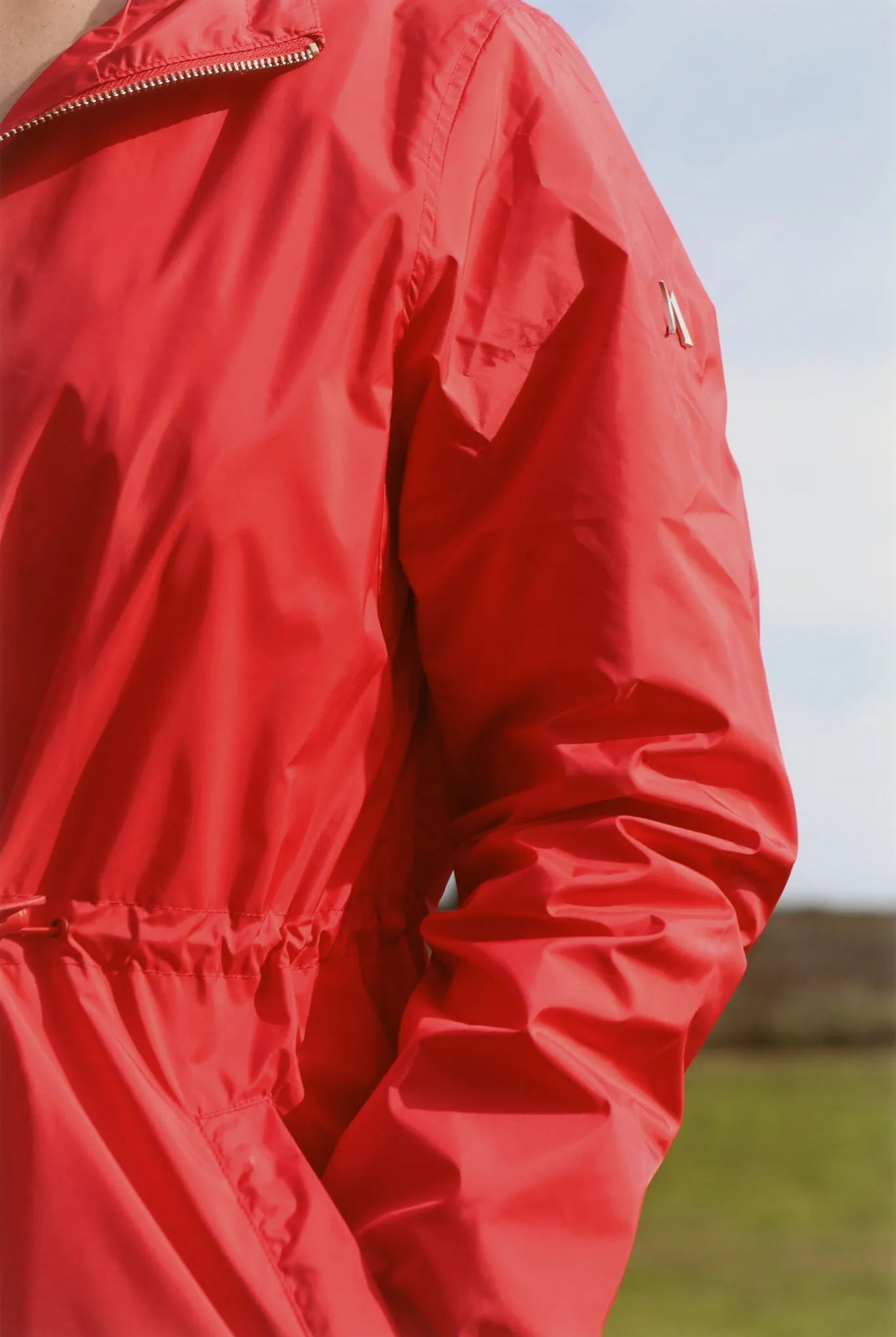 Lipstick Crush No 5 raincoat in bold red, lightweight hooded waterproof raincoat perfect for South Africa’s rainy climate