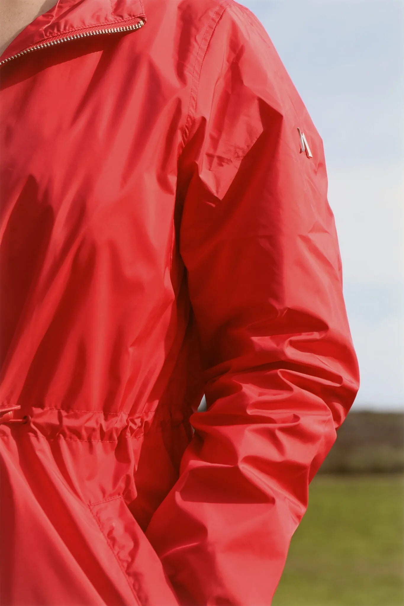 Lipstick Crush No 5 raincoat in bold red, lightweight hooded waterproof raincoat perfect for South Africa’s rainy climate