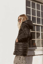 Midnight x Salt Classic Parka™ in black and white, insulated hooded parka designed for warmth and comfort in South Africa’s winter season