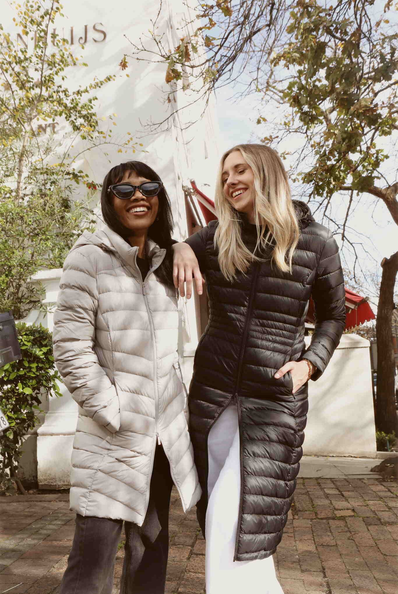 Women’s insulated ultra-length hooded parka in midnight black, designed for extra warmth and comfort in South Africa’s winter season — Midnight Ultra Parka™