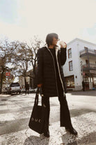 Midnight x Salt Classic Parka™ in black and white, insulated hooded parka designed for warmth and comfort in South Africa’s winter season