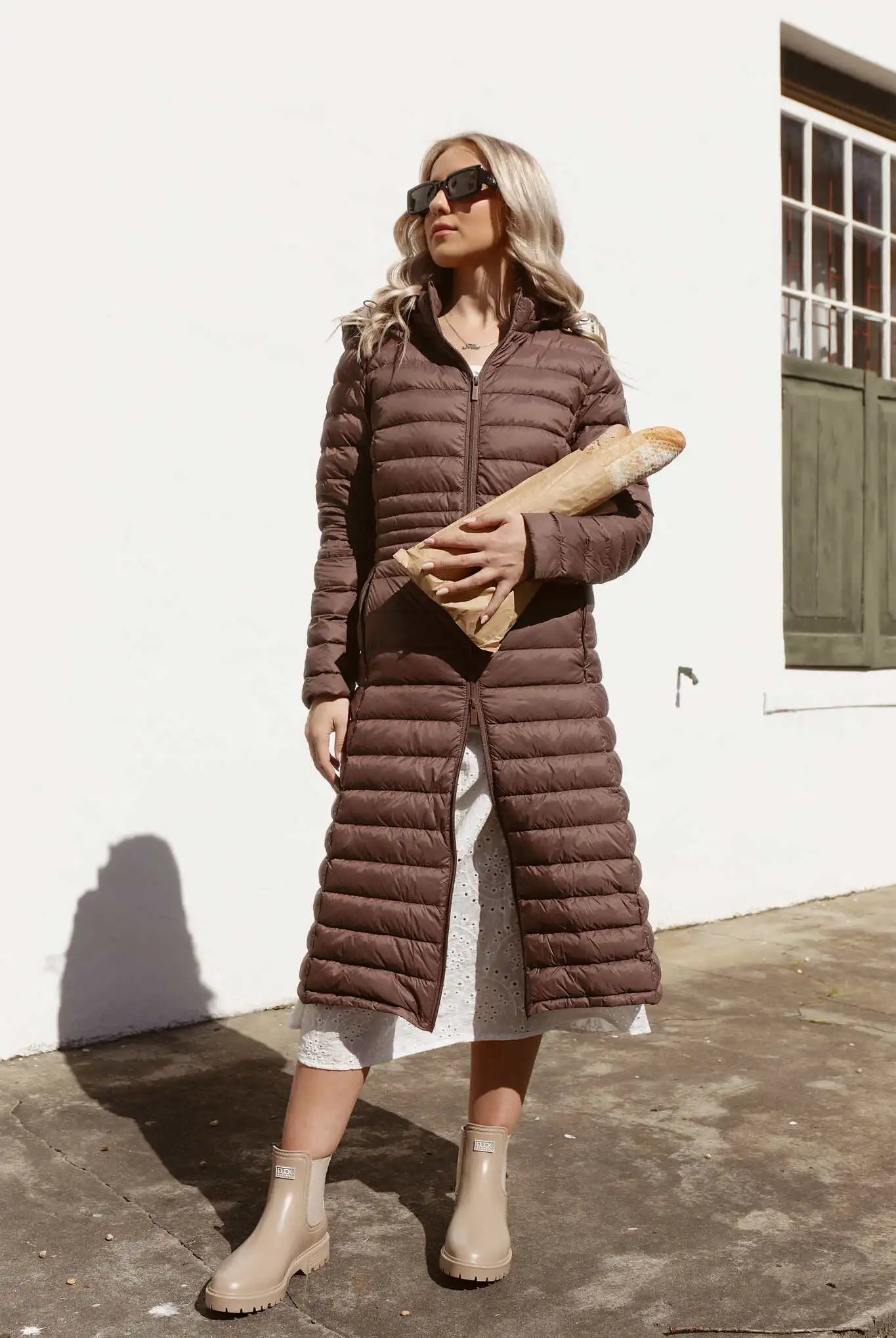 Women’s insulated ultra-length hooded parka in espresso brown, designed for extra warmth and comfort in South Africa’s winter season — Espresso Ultra Parka™