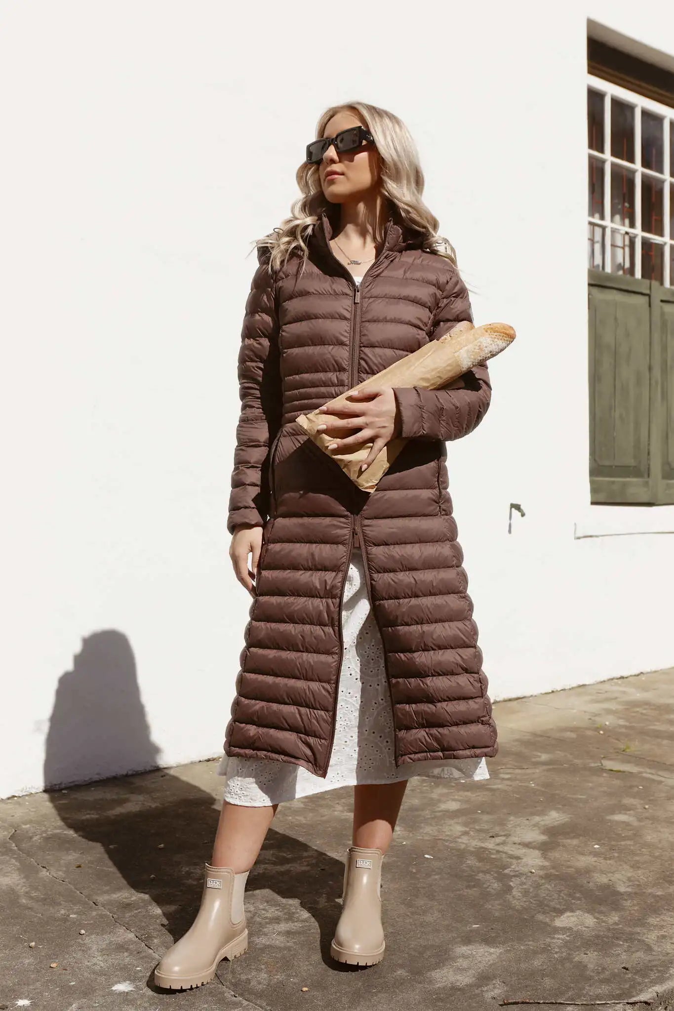 Women’s insulated ultra-length hooded parka in espresso brown, designed for extra warmth and comfort in South Africa’s winter season — Espresso Ultra Parka™