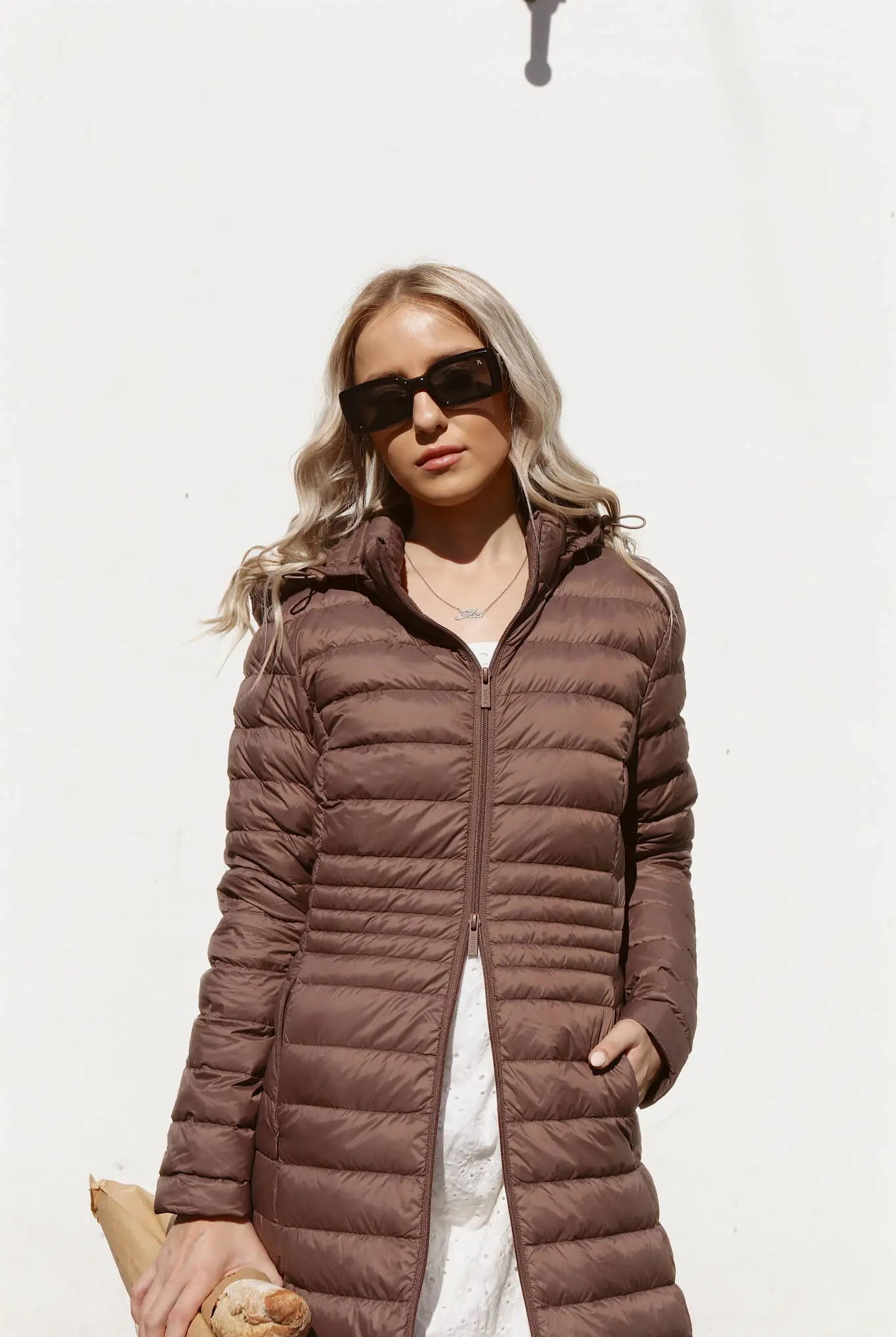 Women’s insulated ultra-length hooded parka in espresso brown, designed for extra warmth and comfort in South Africa’s winter season — Espresso Ultra Parka™