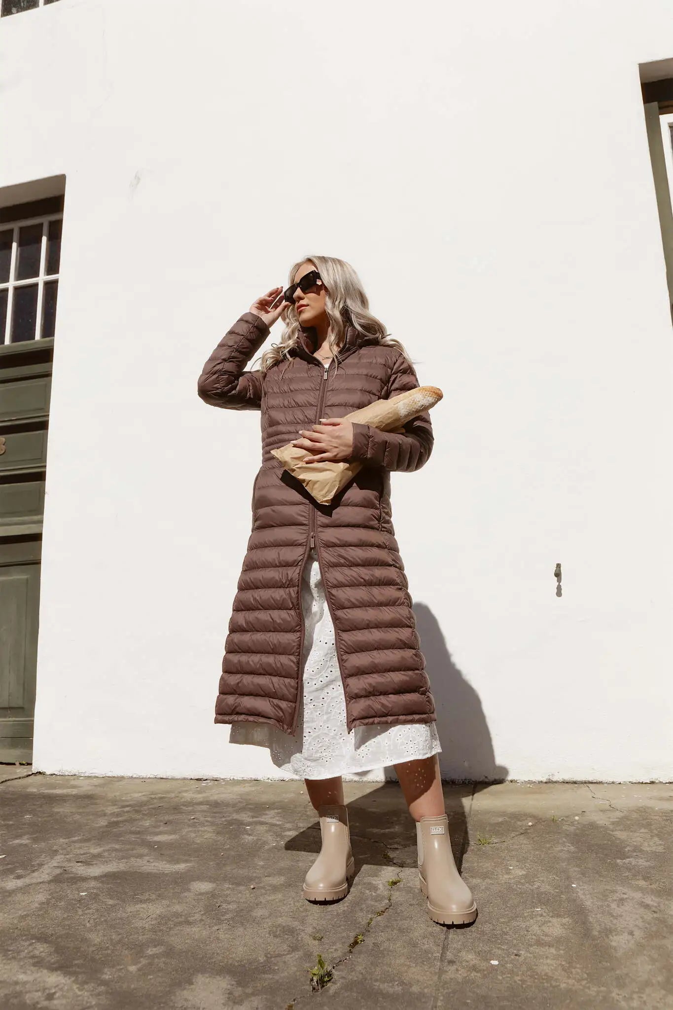 Women’s insulated ultra-length hooded parka in espresso brown, designed for extra warmth and comfort in South Africa’s winter season — Espresso Ultra Parka™