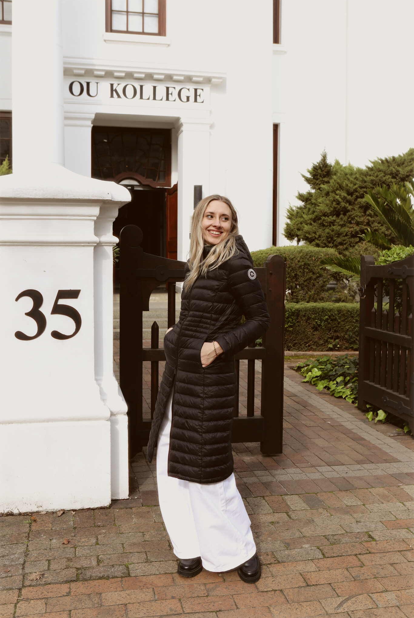 Women’s insulated ultra-length hooded parka in midnight black, designed for extra warmth and comfort in South Africa’s winter season — Midnight Ultra Parka™