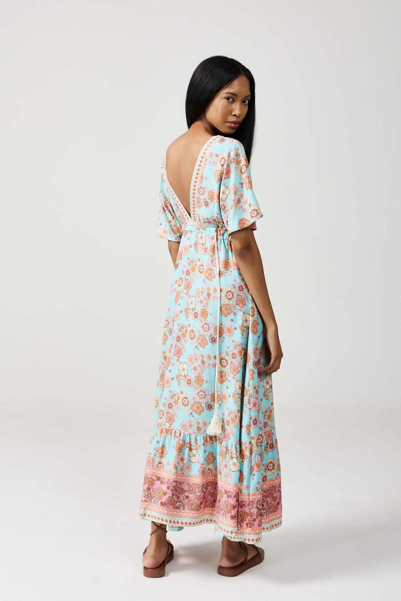 Women’s floral sundress in light blue and pink with a deep V-neck and flowy fit, lightweight summer dress from Duck Apparel South Africa