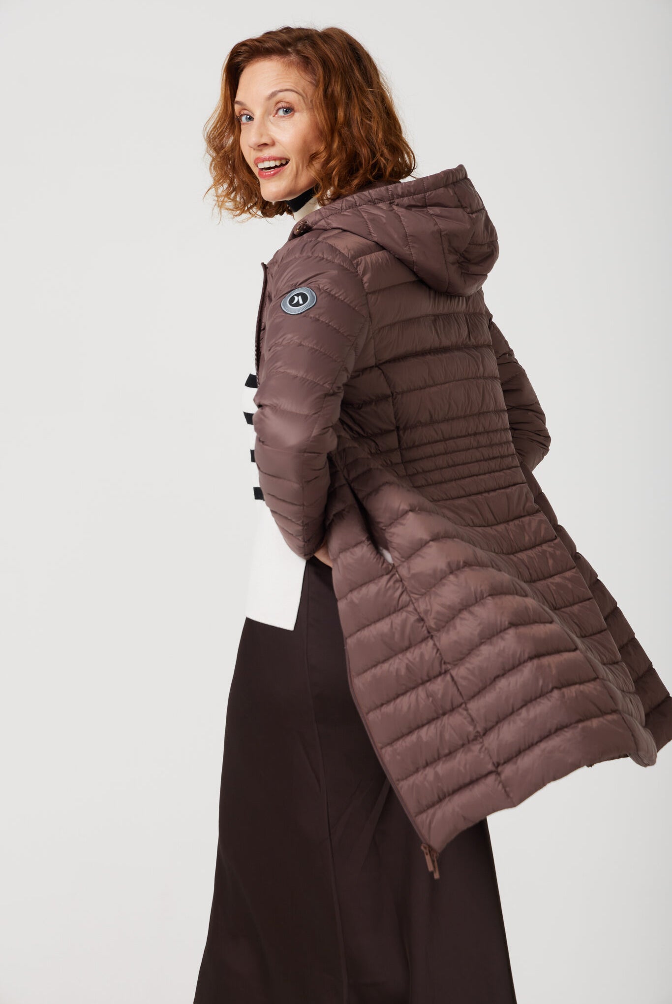 Women’s insulated midi-length hooded parka in espresso brown, designed for warmth and comfort in South Africa’s winter season — Espresso Midi Parka™